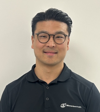 Dr.-Brad-Fujimoto-Chiropractor-Clinic-Director-momentum-health-creekside-calgrary-ab